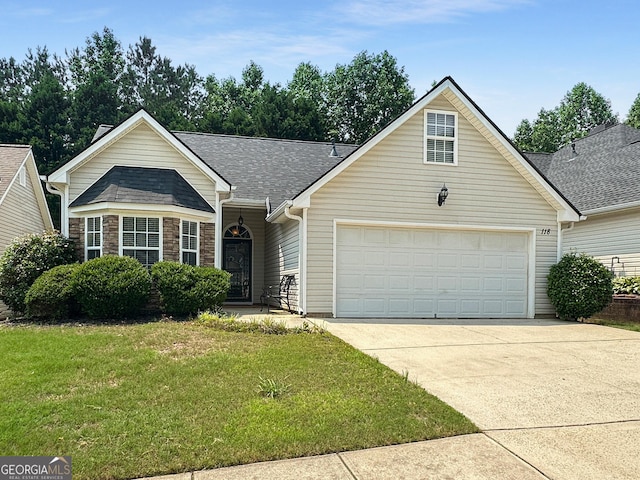 118 Hunterian Pl, Newnan, GA 30265 - traditional-style house with a garage, driveway, a front yard, and a shingled roof