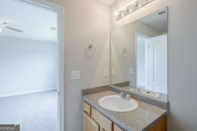 2255 Bigwood Trl, Atlanta, GA 30349 - bathroom featuring vanity, a ceiling fan, and baseboards