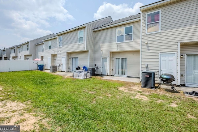 2255 Bigwood Trl, Atlanta, GA 30349 - rear view of house with central air condition unit and a residential view