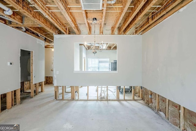 2255 Bigwood Trl, Atlanta, GA 30349 - basement featuring a chandelier