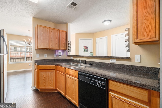 3262 Cascade Parc Blvd SW, Atlanta, GA 30311 - kitchen with dishwasher, dark wood-type flooring, a chandelier, dark countertops, and a textured ceiling