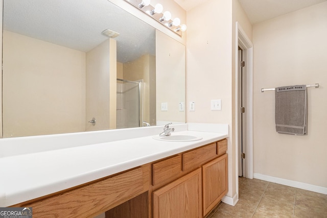 3262 Cascade Parc Blvd SW, Atlanta, GA 30311 - bathroom with vanity, a shower with shower door, and tile patterned flooring