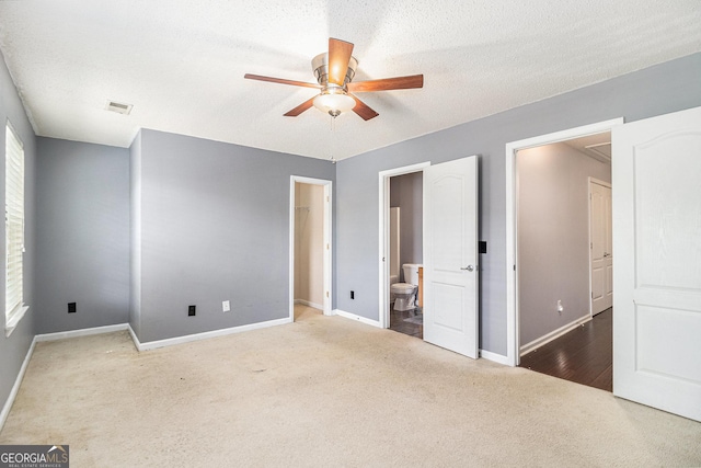 3262 Cascade Parc Blvd SW, Atlanta, GA 30311 - unfurnished bedroom with carpet flooring, ensuite bathroom, and ceiling fan