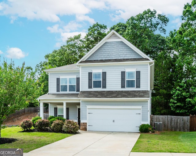 1243 Glenville Ct, Hoschton, GA 30548 - craftsman-style home featuring an attached garage, concrete driveway, central AC unit, and a shingled roof