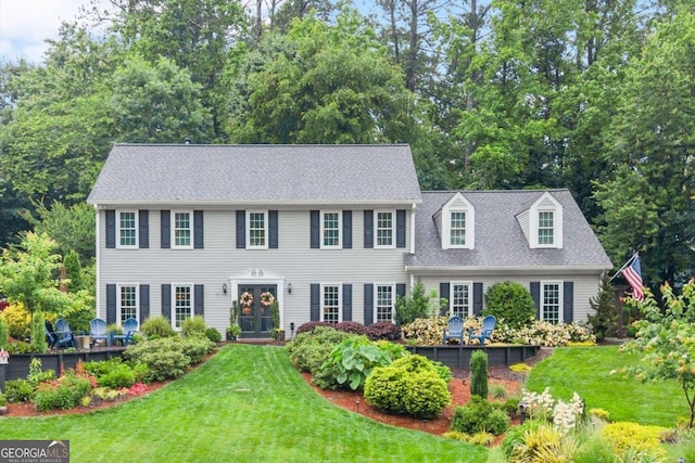 1540 Kinglet Ln, Marietta, GA 30062 - colonial-style house with a front yard and roof with shingles