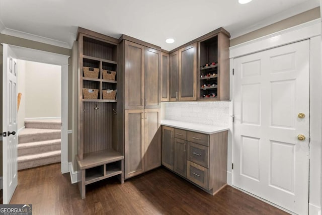 1540 Kinglet Ln, Marietta, GA 30062 - mudroom with ornamental molding, dark wood-style floors, and recessed lighting