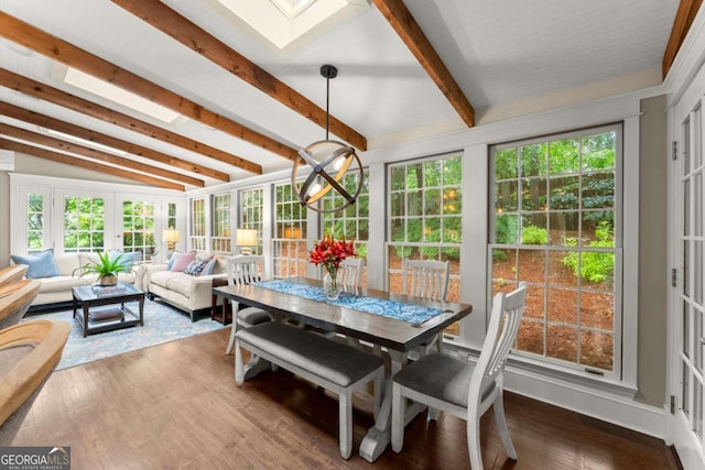 1540 Kinglet Ln, Marietta, GA 30062 - sunroom / solarium with french doors, a skylight, plenty of natural light, and wood finished floors