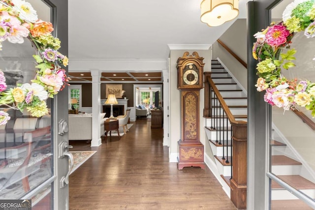 1540 Kinglet Ln, Marietta, GA 30062 - entryway with stairway, wood finished floors, crown molding, and decorative columns