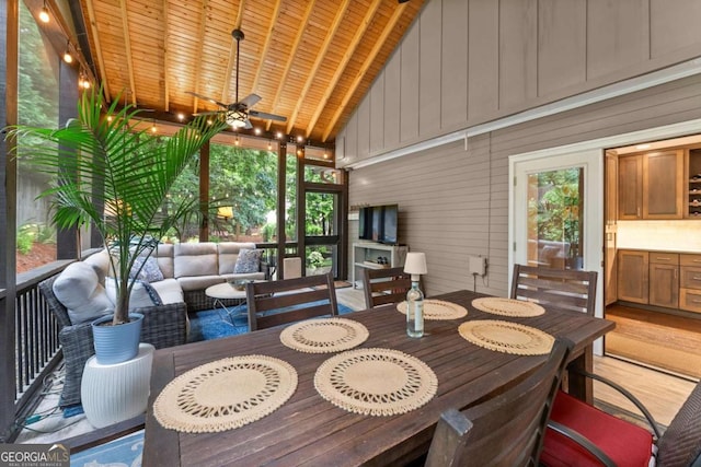 1540 Kinglet Ln, Marietta, GA 30062 - sunroom with outdoor lounge area, healthy amount of natural light, ceiling fan, and lofted ceiling