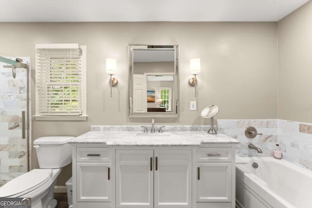 1540 Kinglet Ln, Marietta, GA 30062 - bathroom with vanity, a garden tub, toilet, and a shower stall