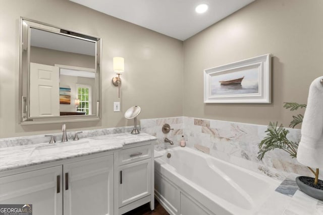 1540 Kinglet Ln, Marietta, GA 30062 - bathroom featuring a garden tub and vanity