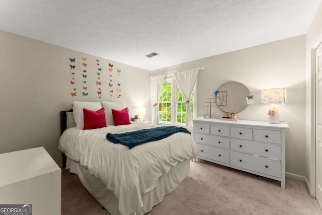1540 Kinglet Ln, Marietta, GA 30062 - carpeted bedroom featuring a textured ceiling