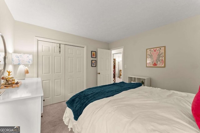 1540 Kinglet Ln, Marietta, GA 30062 - bedroom featuring light colored carpet and a closet