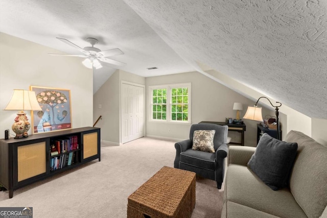 1540 Kinglet Ln, Marietta, GA 30062 - living area with carpet, vaulted ceiling, a textured ceiling, a ceiling fan, and baseboards