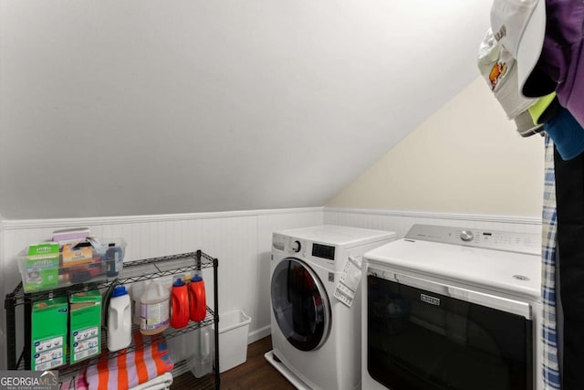 1540 Kinglet Ln, Marietta, GA 30062 - laundry area featuring washer and clothes dryer, dark wood-type flooring, and wainscoting