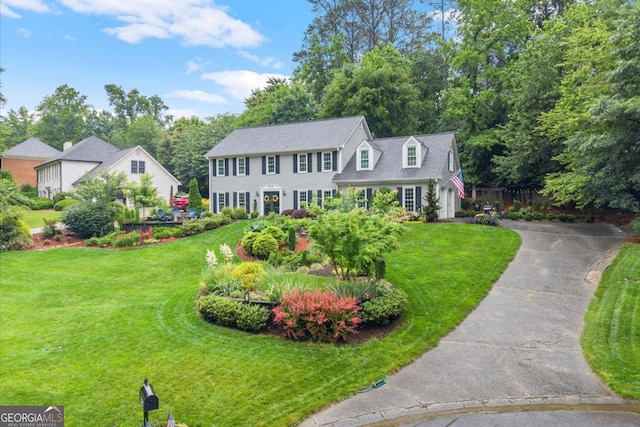 1540 Kinglet Ln, Marietta, GA 30062 - colonial house with a front yard and asphalt driveway