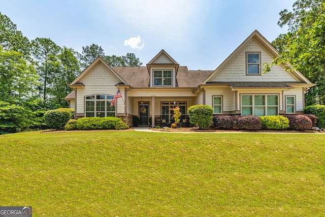 172 Walden Pond Trl, Senoia, GA 30276 - view of front of house featuring a front yard and roof with shingles