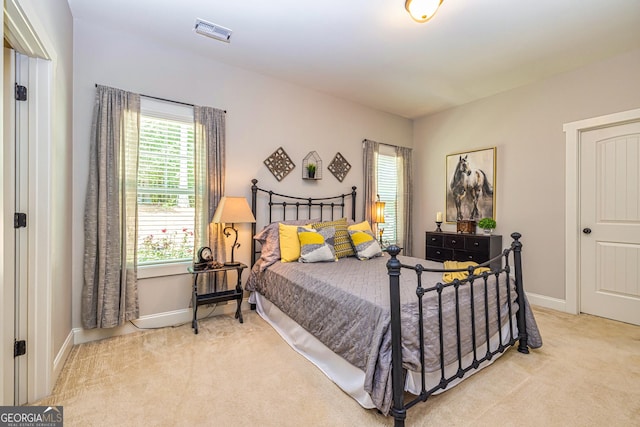 172 Walden Pond Trl, Senoia, GA 30276 - carpeted bedroom featuring baseboards