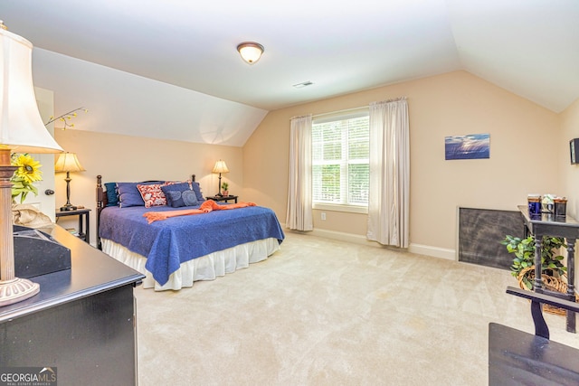172 Walden Pond Trl, Senoia, GA 30276 - carpeted bedroom featuring vaulted ceiling and baseboards