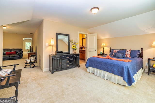 172 Walden Pond Trl, Senoia, GA 30276 - bedroom with light carpet, vaulted ceiling, and baseboards