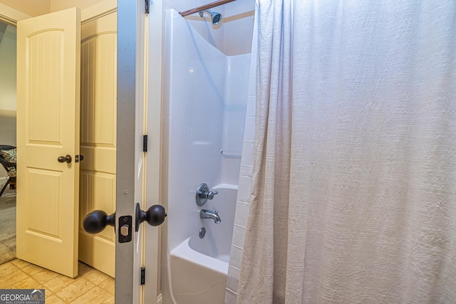 172 Walden Pond Trl, Senoia, GA 30276 - bathroom featuring shower / bathtub combination with curtain and tile patterned floors