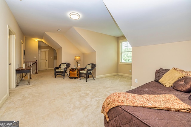 172 Walden Pond Trl, Senoia, GA 30276 - carpeted bedroom with lofted ceiling and baseboards