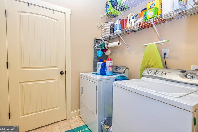 172 Walden Pond Trl, Senoia, GA 30276 - laundry room featuring independent washer and dryer and light tile patterned flooring