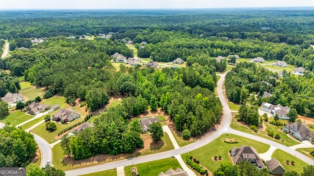 172 Walden Pond Trl, Senoia, GA 30276 - aerial view of residential area featuring a heavily wooded area