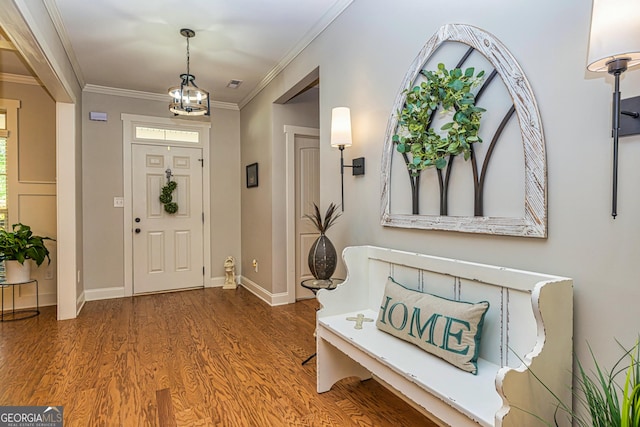 172 Walden Pond Trl, Senoia, GA 30276 - foyer with wood finished floors, crown molding, and baseboards