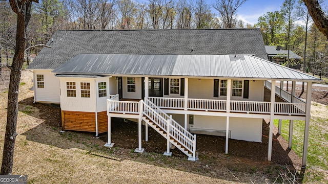 219 Fairview Dr, Morganton, GA 30560 - view of front of home featuring a metal roof, a porch, and stairway
