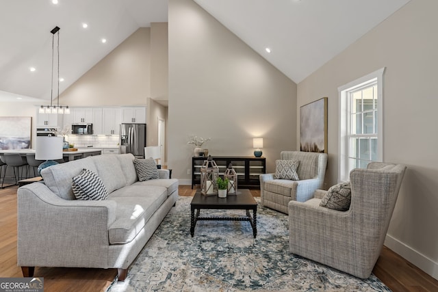 219 Fairview Dr, Morganton, GA 30560 - living room featuring high vaulted ceiling, wood finished floors, and recessed lighting