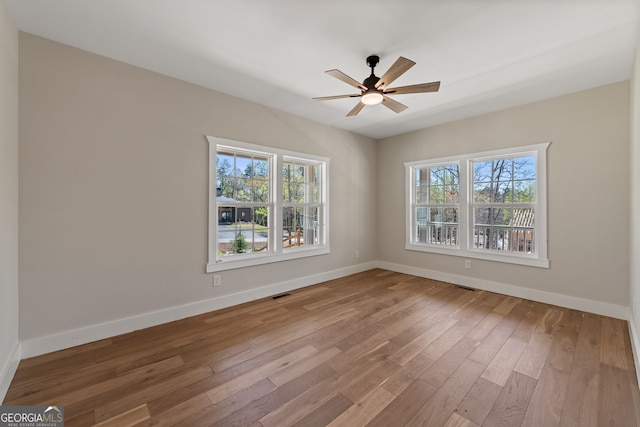219 Fairview Dr, Morganton, GA 30560 - unfurnished room with plenty of natural light, hardwood / wood-style flooring, and ceiling fan