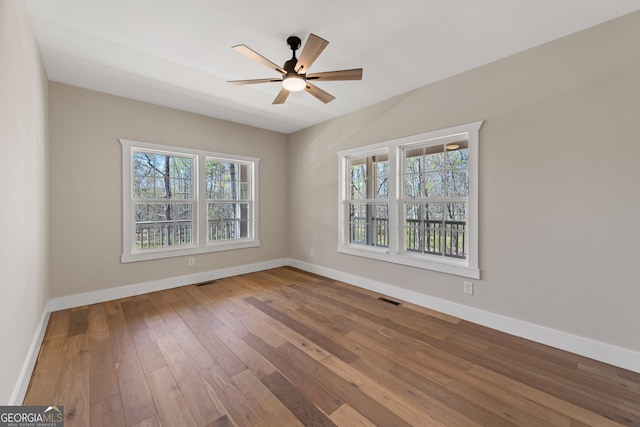 219 Fairview Dr, Morganton, GA 30560 - unfurnished room featuring hardwood / wood-style floors and ceiling fan