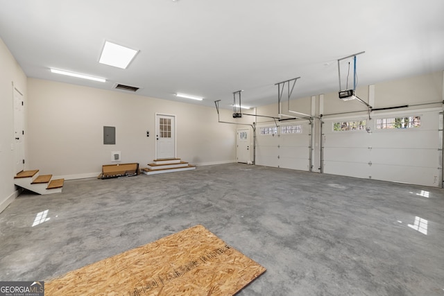219 Fairview Dr, Morganton, GA 30560 - garage with electric panel and a garage door opener