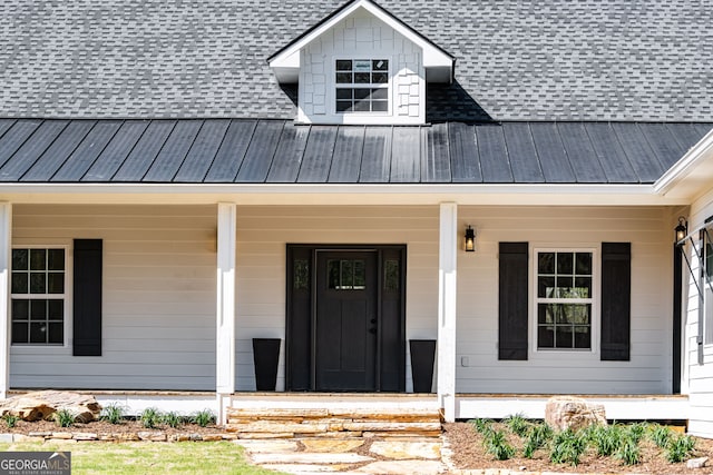 219 Fairview Dr, Morganton, GA 30560 - view of exterior entry featuring a metal roof, covered porch, and a shingled roof