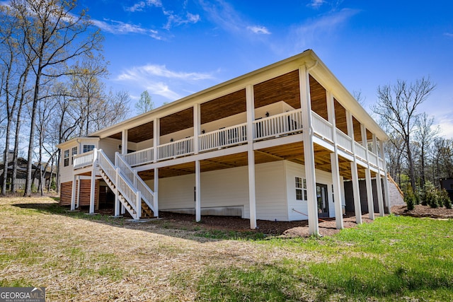 219 Fairview Dr, Morganton, GA 30560 - back of property with stairway and a deck