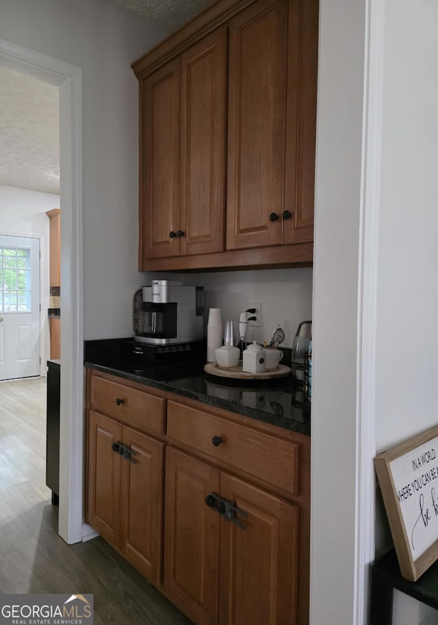10315 Whisper Glen Dr, Midland, GA 31820 - bar area featuring wood finished floors and a textured ceiling