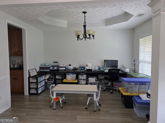 10315 Whisper Glen Dr, Midland, GA 31820 - home office featuring a tray ceiling, crown molding, wood finished floors, a textured ceiling, and a chandelier