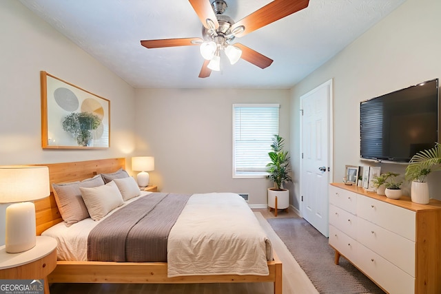 4457 Lincoln Jones Rd, Ellenwood, GA 30294 - bedroom featuring baseboards and ceiling fan