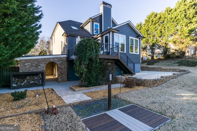 271 Double Gate Ct, Sugar Hill, GA 30518 - rear view of property with a patio area, a chimney, and stairs