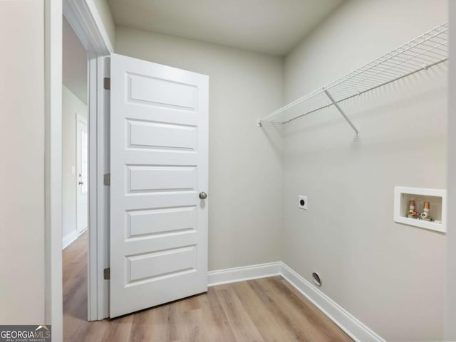 204 Rachel Ln, Hartwell, GA 30643 - washroom featuring hookup for a washing machine, light wood-type flooring, hookup for an electric dryer, and baseboards