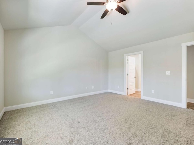204 Rachel Ln, Hartwell, GA 30643 - unfurnished bedroom with carpet floors, baseboards, vaulted ceiling, and ceiling fan