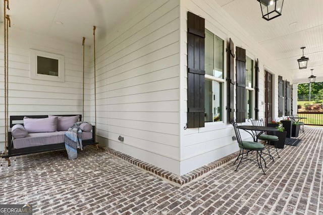 4110 Gentle Breeze Way, Braselton, GA 30517 - view of covered porch