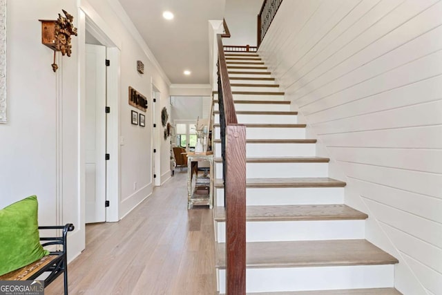 4110 Gentle Breeze Way, Braselton, GA 30517 - stairway featuring wood finished floors, ornamental molding, recessed lighting, and baseboards