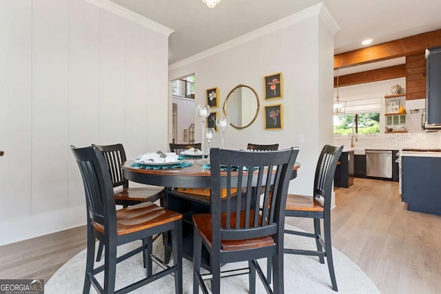 4110 Gentle Breeze Way, Braselton, GA 30517 - dining room with light wood-type flooring, crown molding, a chandelier, and recessed lighting
