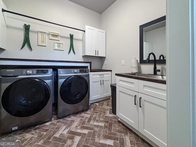 4110 Gentle Breeze Way, Braselton, GA 30517 - washroom featuring cabinet space, independent washer and dryer, and brick patterned floors