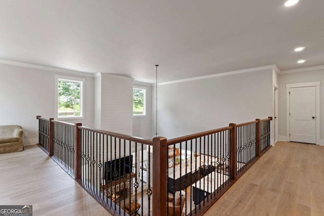 4110 Gentle Breeze Way, Braselton, GA 30517 - corridor with light wood-type flooring, ornamental molding, recessed lighting, and baseboards