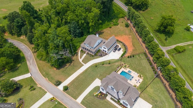 4110 Gentle Breeze Way, Braselton, GA 30517 - aerial view of property and surrounding area featuring a pool