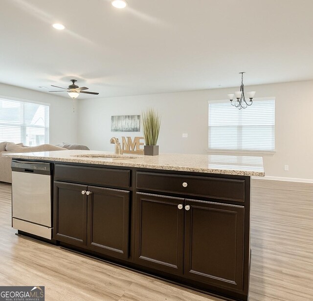 1317 Rosemary Ln # 65, East Point, GA 30344 - kitchen with dishwasher, dark brown cabinets, light wood-style floors, a chandelier, and open floor plan