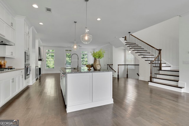 113 Quinn Way, Milton, GA 30004 - kitchen featuring stainless steel appliances, light stone countertops, dark wood-style flooring, recessed lighting, and white cabinets